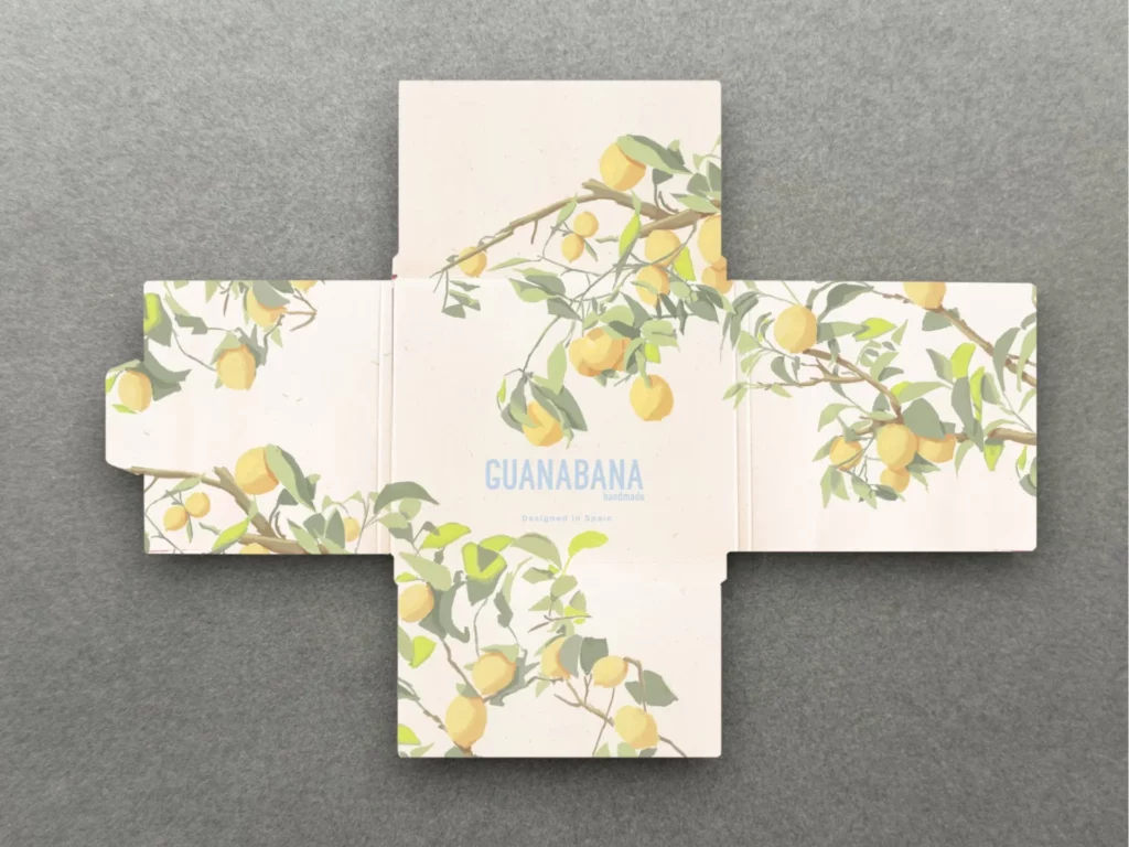Caja ilustrada con limones desplegada tras el troquelado