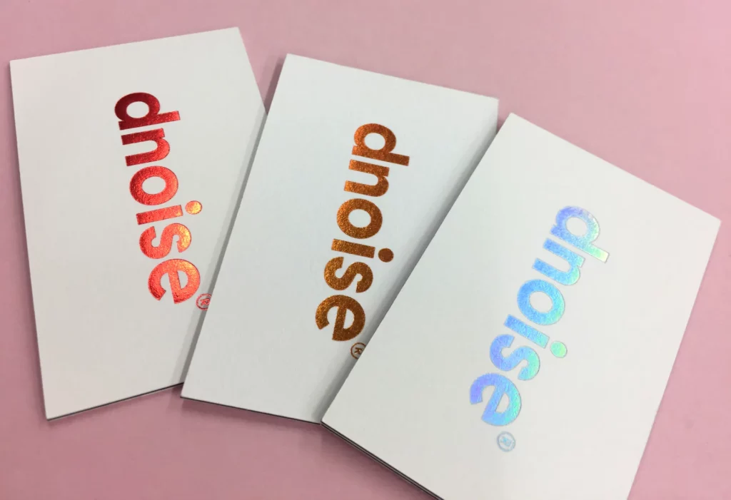 Tarjetas de visita con stamping en cobre, oro y holográfico